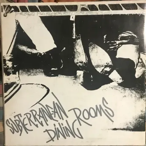 Background image for Subterranean Dining Rooms - There's No Rock'N'Roll Singer Without A Spanish Knife